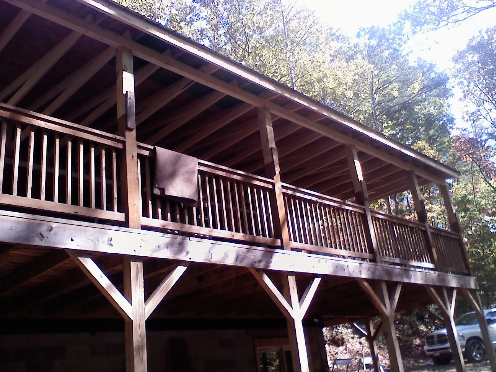 Timber framing under a new elevated porch and deck — Roof Leak Repair in Niwot by Roofing Brothers